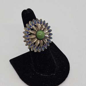 gold tone large flower cocktail ring with blue and green cabochons size 7.25
